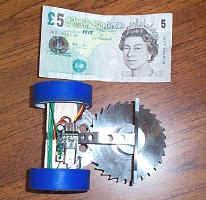 Comparing an Ant Weight Robot to the size of a �5 note.