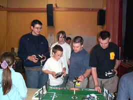 People Cheer as they go mad for Robo Soccer!