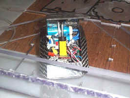 An Antweight with it's raised flipping arm.